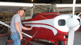 Brian Shaw and a repainted small propellor plane